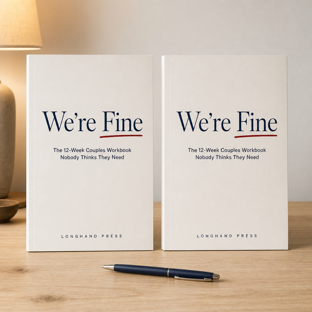 Two copies of the We're Fine workbook standing on a kitchen table