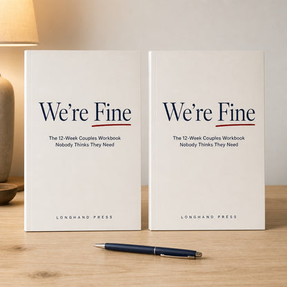 Two copies of the We're Fine workbook standing on a kitchen table